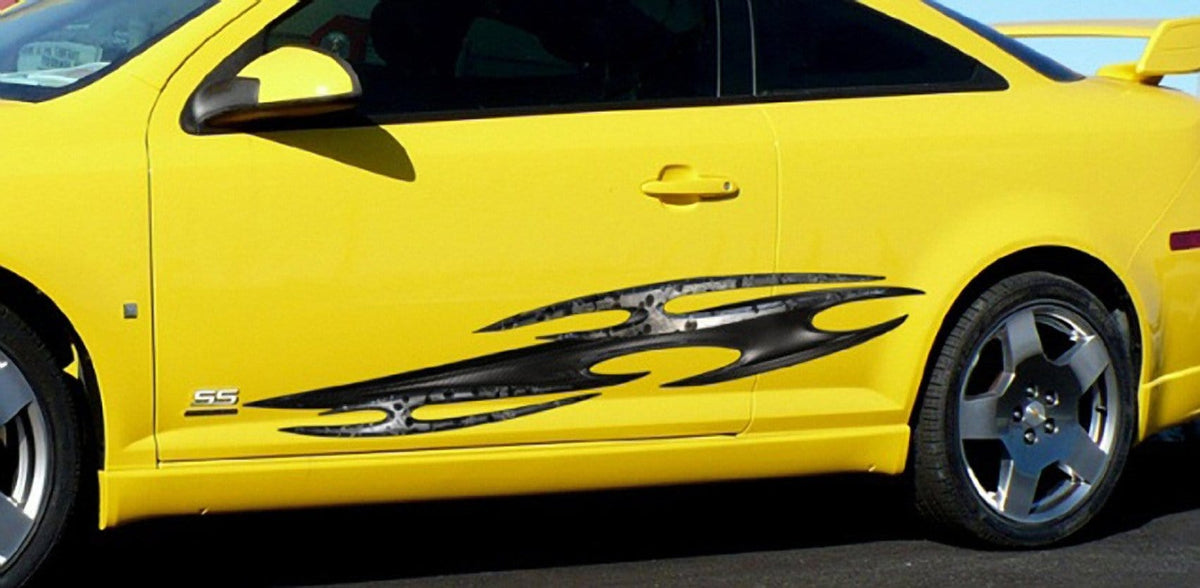 tribal vinyl graphics on the side of yellow sports car